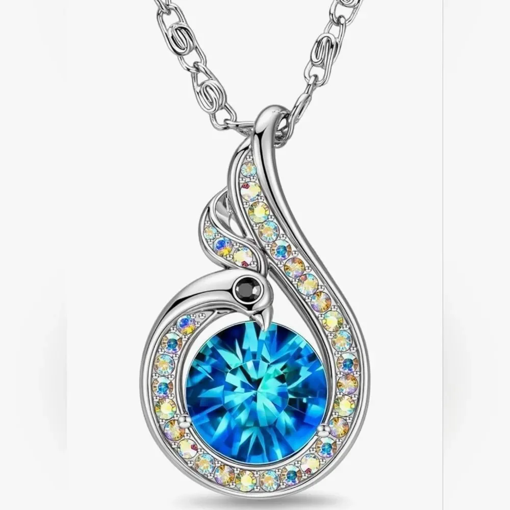 🩵⏭️NIB White Gold Plated Blue Crystal Sapphire Phoenix Pendant Necklace